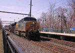 CSX 932 leads an X404